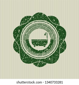 Green bathtub icon inside rubber grunge seal