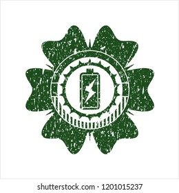  Green battery charging icon inside rubber stamp