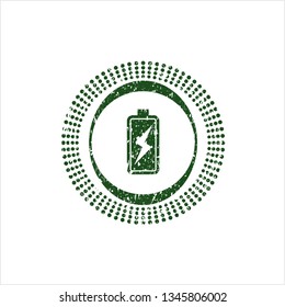 Green battery charging icon inside rubber seal