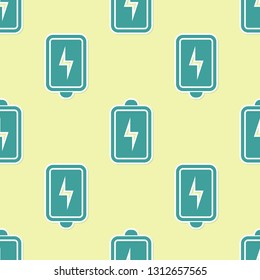 Green Battery icon isolated seamless pattern on yellow background. Lightning bolt symbol. Flat design. Vector Illustration