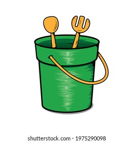 Green beach bucket with the tools, namely a spoon and a sand fork