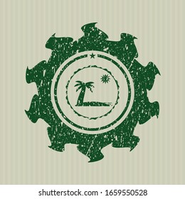 Green beach icon inside grunge stamp