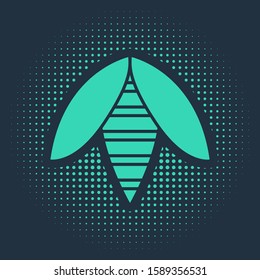 Green Bee icon isolated on blue background. Sweet natural food. Honeybee or apis with wings symbol. Flying insect. Abstract circle random dots. Vector Illustration