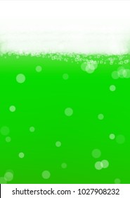 Green beer background for Saint Patricks Day with bubbles and foam.