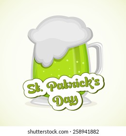 Green beer in a mug for Happy St. Patrick's Day celebration.