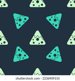 Green and beige Nachos icon isolated seamless pattern on blue background. Tortilla chips or nachos tortillas. Traditional mexican fast food.  Vector