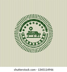 Green bench press icon inside rubber seal
