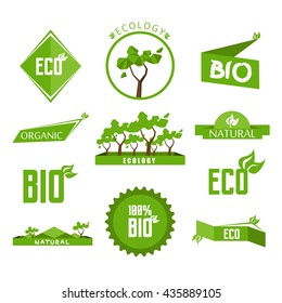 Green bio eco labels and badges set with leaves for organic, natural, bio and eco friendly products. Vector illustration. Isolated on white background.
