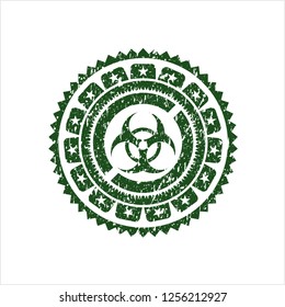 Green biohazard icon inside grunge style stamp