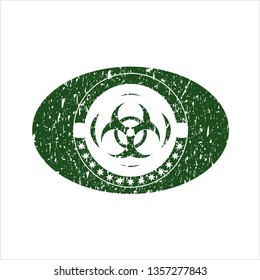 Green biohazard icon inside grunge stamp