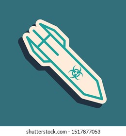 Green Biohazard rocket icon isolated on blue background. Rocket bomb flies down. Long shadow style. Vector Illustration