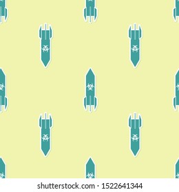 Green Biohazard rocket icon isolated seamless pattern on yellow background. Rocket bomb flies down.  Vector Illustration