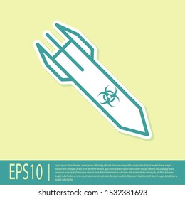 Green Biohazard rocket icon isolated on yellow background. Rocket bomb flies down.  Vector Illustration