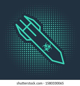 Green Biohazard rocket icon isolated on blue background. Rocket bomb flies down. Abstract circle random dots. Vector Illustration