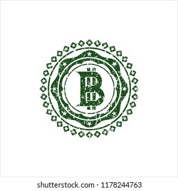 Green bitcoin icon inside distressed rubber grunge texture stamp