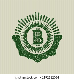 Green bitcoin icon inside distressed grunge style stamp
