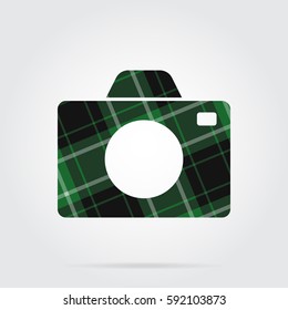green, black isolated tartan icon with white stripes - camera and shadow in front of a gray background