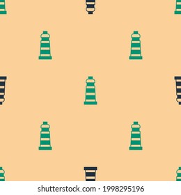 Icono de faro verde y negro aislado de un patrón sin fisuras en el fondo beige.  Vector