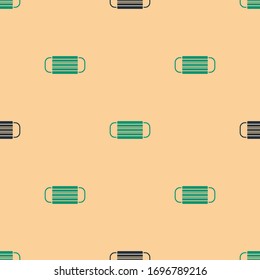 Green and black Medical protective mask icon isolated seamless pattern on beige background.  Vector Illustration