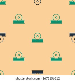 Green and black Otolaryngological head reflector icon isolated seamless pattern on beige background. Equipment for inspection the patient's ear, throat and nose.  Vector Illustration