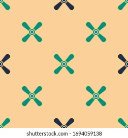 Green and black Plane propeller icon isolated seamless pattern on beige background. Vintage aircraft propeller.  Vector Illustration