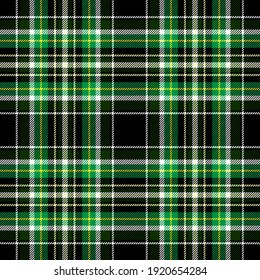 Green and black tartan. Seamless vector plaid pattern suitable for fashion, interiors and st Patrick’s day decor