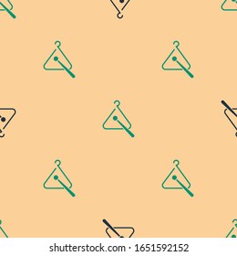 Green and black Triangle musical instrument icon isolated seamless pattern on beige background.  Vector Illustration