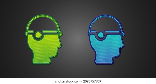 Green and blue Baseball helmet icon isolated on black background.  Vector