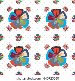 In green and blue colorsVC seamless background pattern with tropical leaves and flowers in green and blue colors.