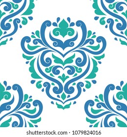 Green and blue damask vector seamless pattern. Elegant classic texture. Luxury ornament. Royal, Victorian, Baroque elements. Great for fabric and textile, packaging, wallpaper, or any desired idea.