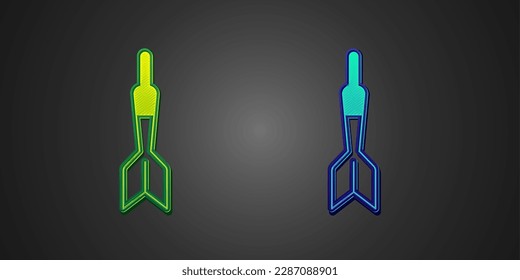 Green and blue Dart arrow icon isolated on black background.  Vector