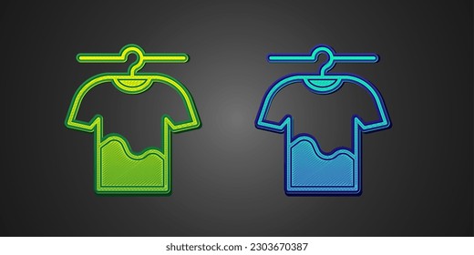 Green and blue Drying clothes icon isolated on black background. Clean shirt. Wash clothes on a rope with clothespins. Clothing care and tidiness.  Vector
