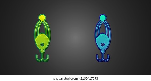 Green and blue Fishing lure icon isolated on black background. Fishing tackle.  Vector