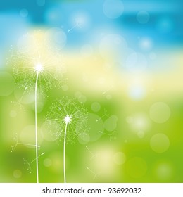Green and blue light abstract background with dandelions
