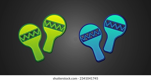 Green and blue Maracas icon isolated on black background. Music maracas instrument mexico.  Vector