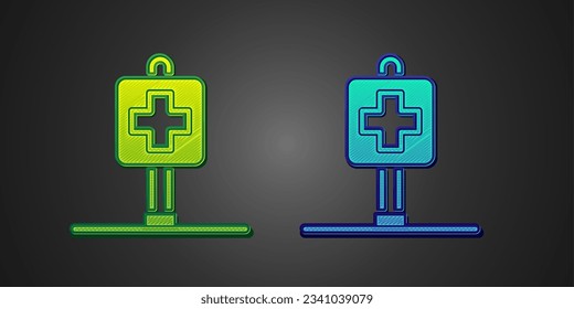 Green and blue Medical map pointer with cross hospital icon isolated on black background.  Vector