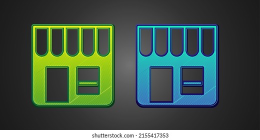 Green and blue Shopping building or market store icon isolated on black background. Shop construction.  Vector