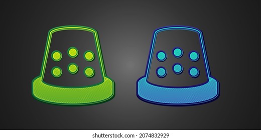 Green and blue Thimble for sewing icon isolated on black background.  Vector
