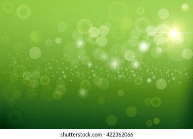 Green blurred background and sunlight, natural green background.