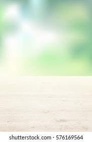 Green bokeh background. Blurred background. Out of focus. Wooden table. Wood texture. Vertical.