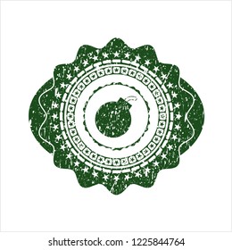 Green bomb icon inside rubber stamp