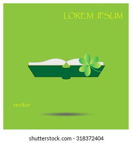 green book and clover, icon