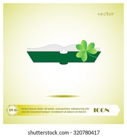 green book and clover, icon