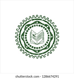 Green book icon inside rubber grunge seal