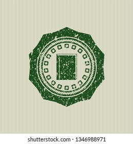 Green book icon inside rubber grunge seal