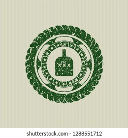 Green bottle of alcohol icon inside grunge style stamp