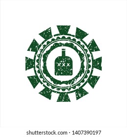 Green bottle of alcohol icon inside distressed rubber grunge texture stamp