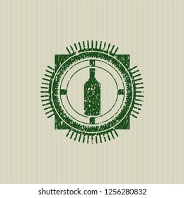 Green bottle icon inside distress grunge stamp