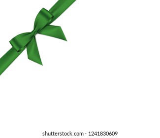 Green bow and ribbon realistic shiny satin with shadow place on corner of paper for decorate your christmas card or website vector EPS10 isolated on white background.