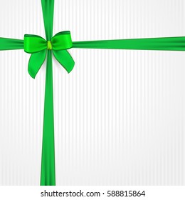 Green bow for Saint Patrick's day. Vector green decorative bow on a ribbon. Festive ribbon bow on white background - greeting card for traditional irish holiday